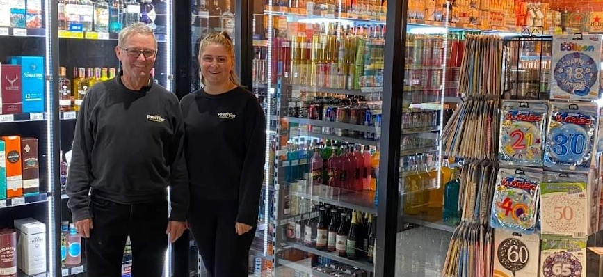 Premier Whitehills Owner Billy Gatt and Grandaughter Bethany Gatt standing inside the shop