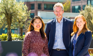 This image shows three NatWest Group colleagues standing together. 