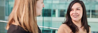 Two NatWest Group colleagues in conversation