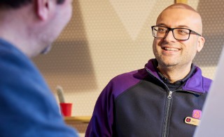Branch colleague smiling at a customer