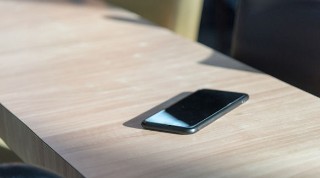 Smartphone on wooden surface
