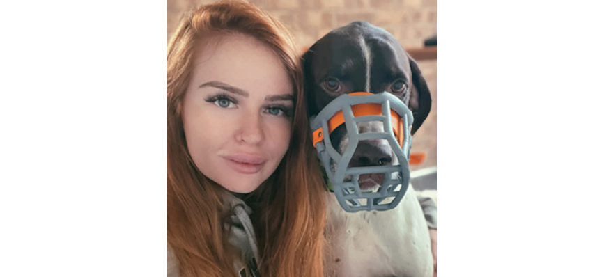 Photograph of Clara Hewson with her dog, Tolly