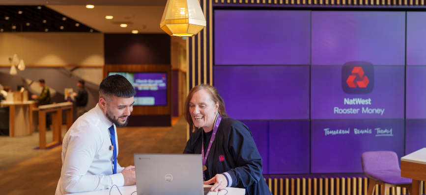 Image showing two NatWest branch staff looking at a laptop