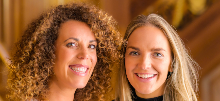 Photograph of Lou Doyle and Steph Scholes, founders of Needi
