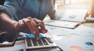 hand using a calculator
