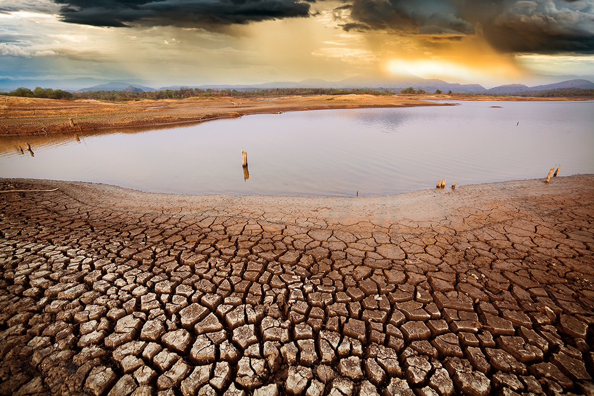 thunder storm sky Rain clouds Cracked dry land without water