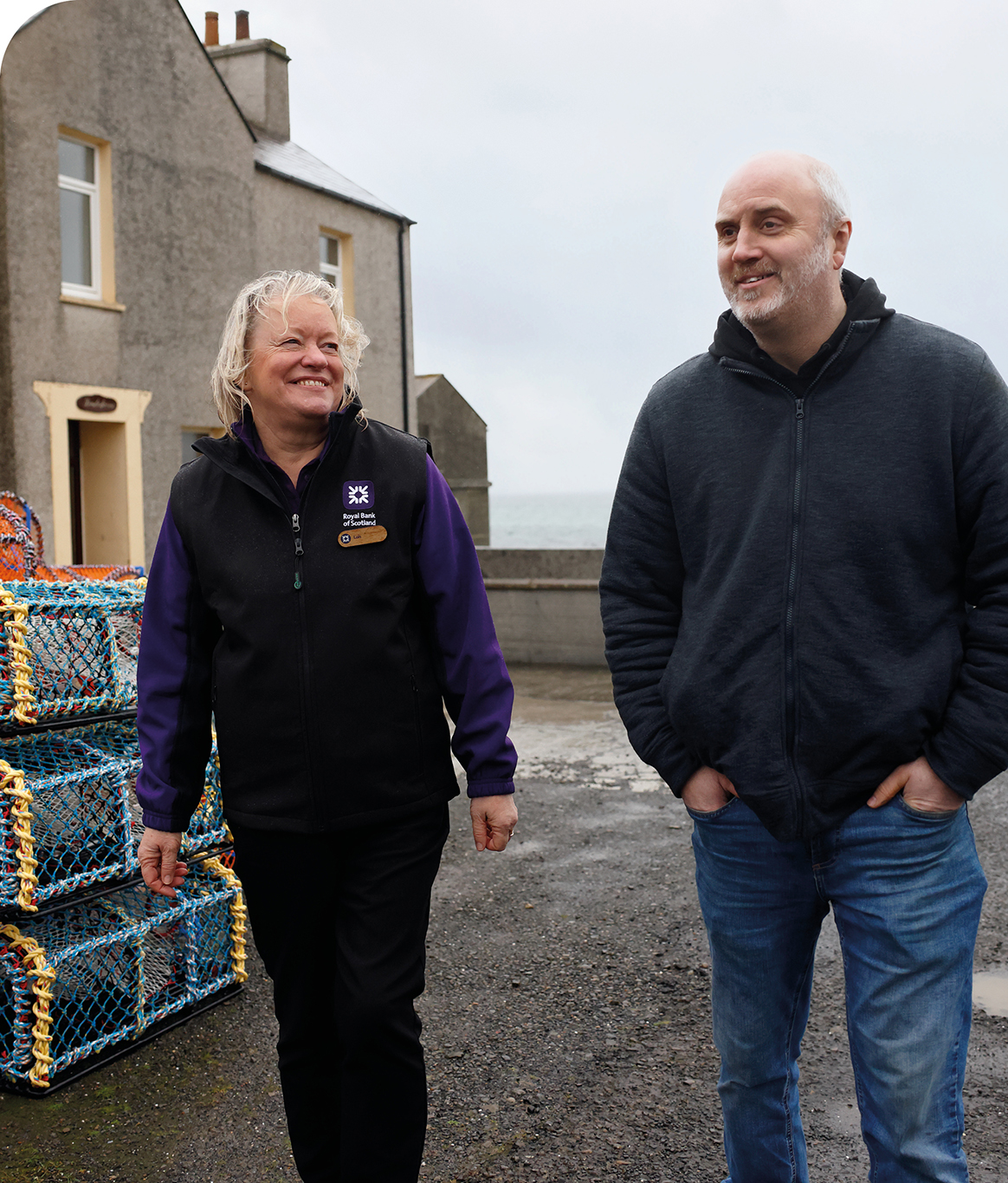 Lois Canning, Personal Banker, and Stuart Groat, Royal Bank of Scotland customer in the Orkney Islands 