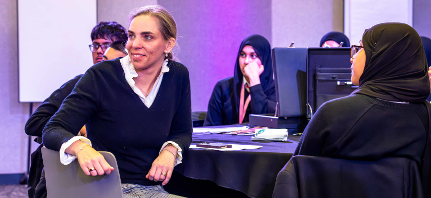 CEO Retail Banking Solange Chamberlain at a NatWest Thrive event with students from an East London school, watching a presentation