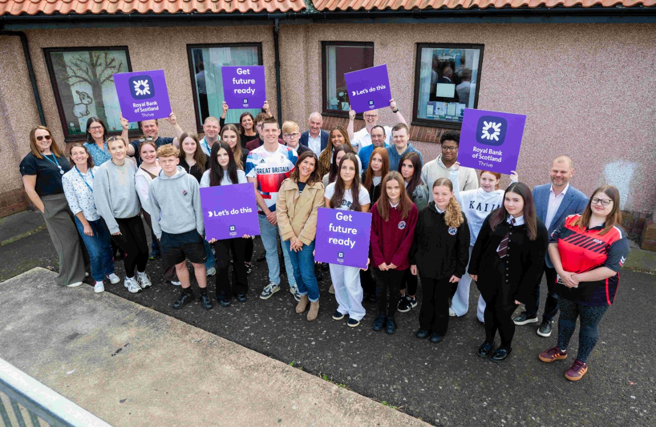 Image shows Duncan Scott, young people, Royal Bank staff, YouthLink Scotland staff and local MSP Paul McLennan outside the Port Seton Community Centre.